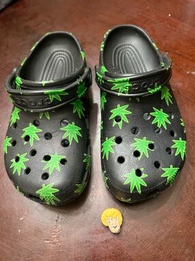 CROCS Black Clogs with Bright Green Leaf